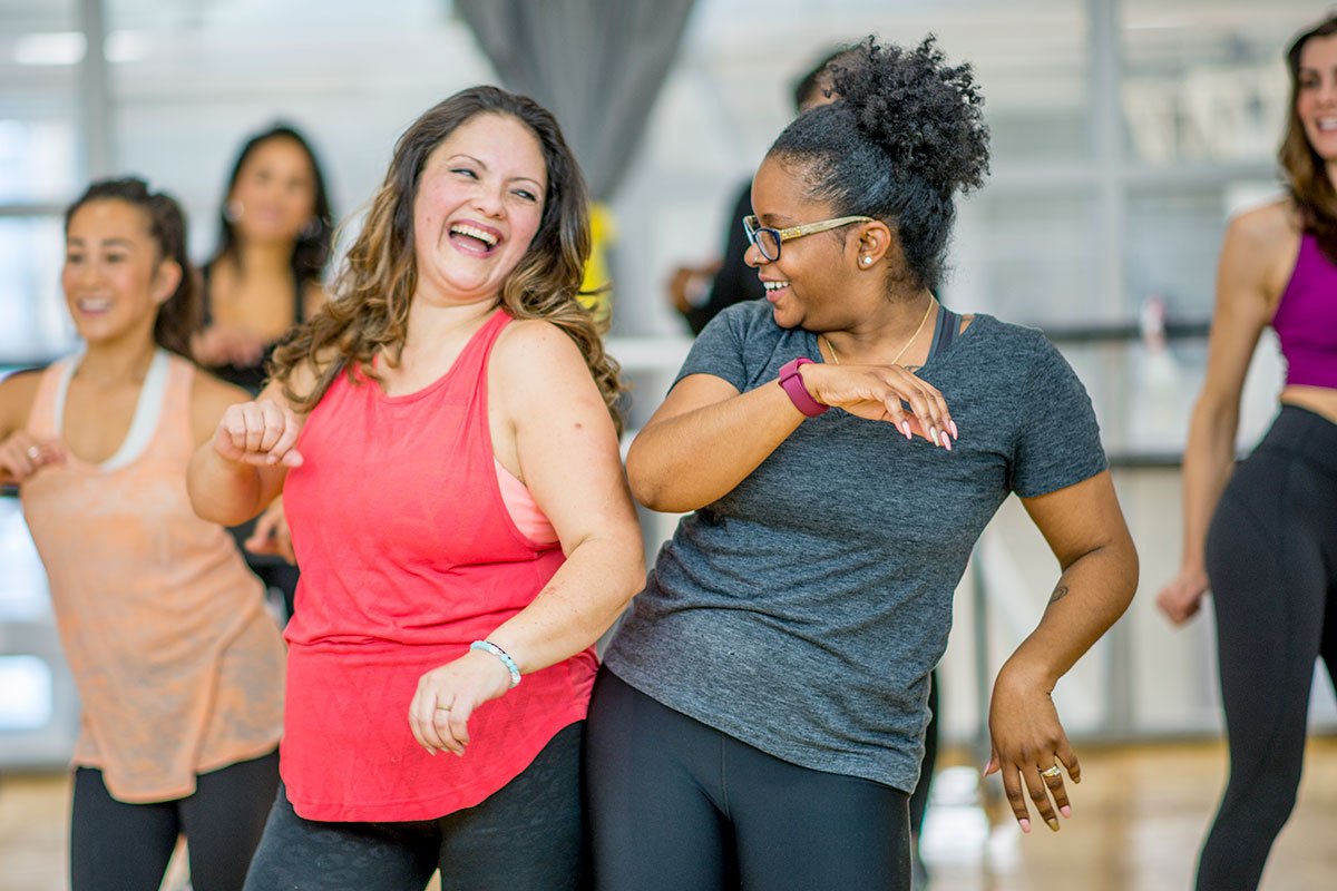 Participants dancing together during the cardio dance class